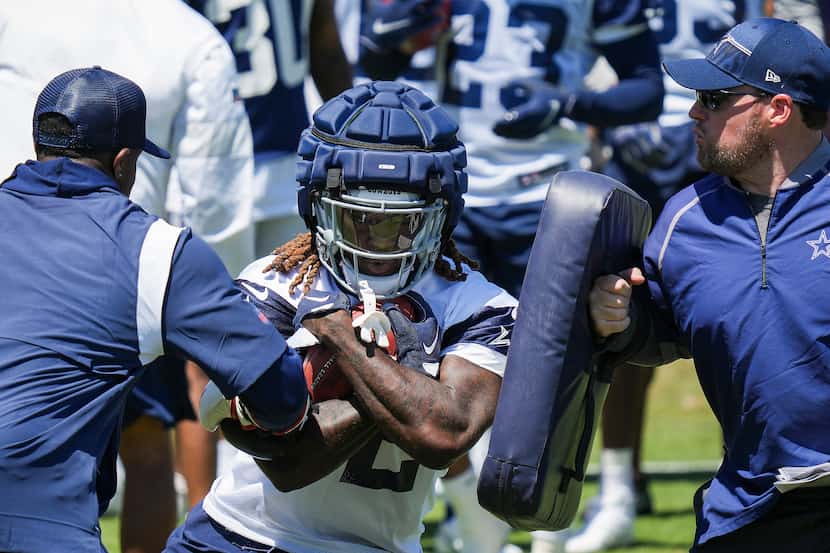 Dallas Cowboys running back Ronald Jones (32) participates in a drill during a training camp...