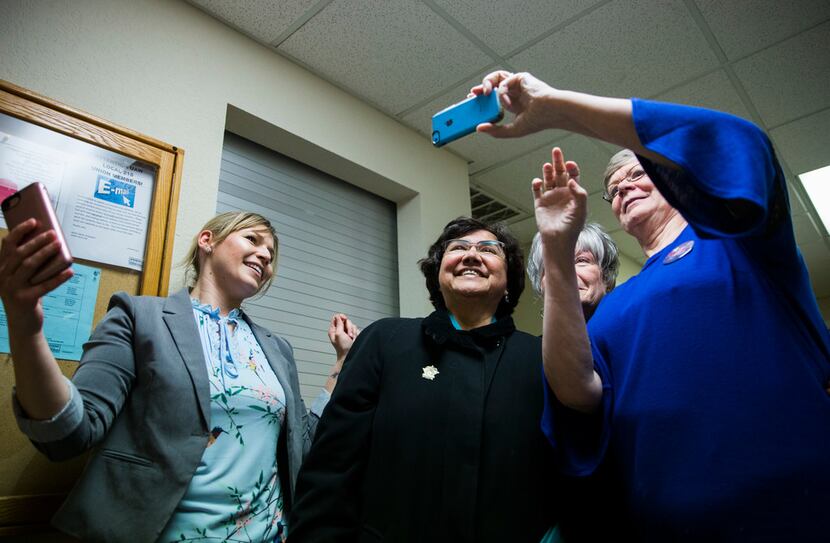 Gubernatorial candidate and former Dallas Sheriff Lupe Valdez takes selfies with supporters...