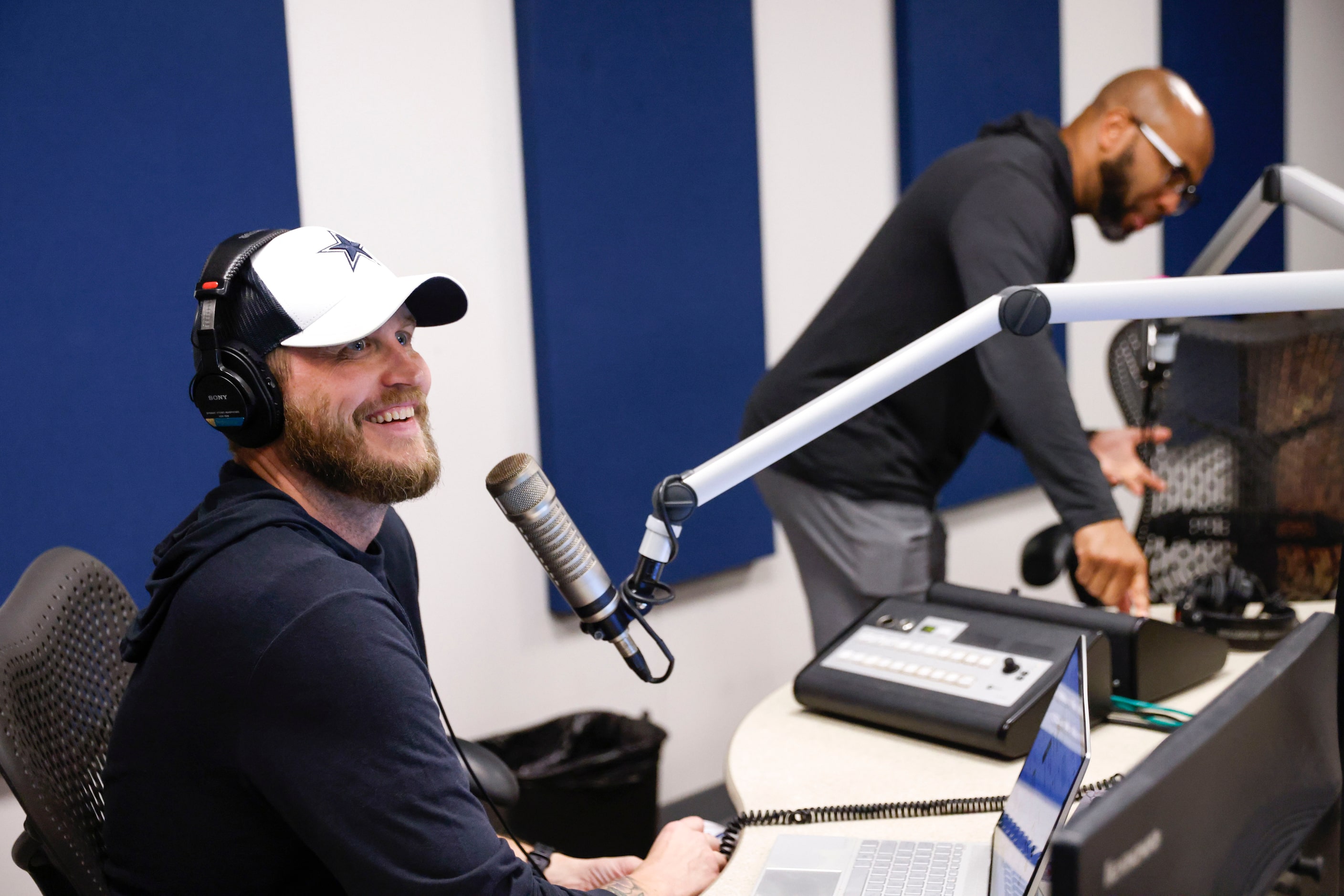  "The Ticket" host Matt McClearin (left) reacts towards the producers during a segment of...