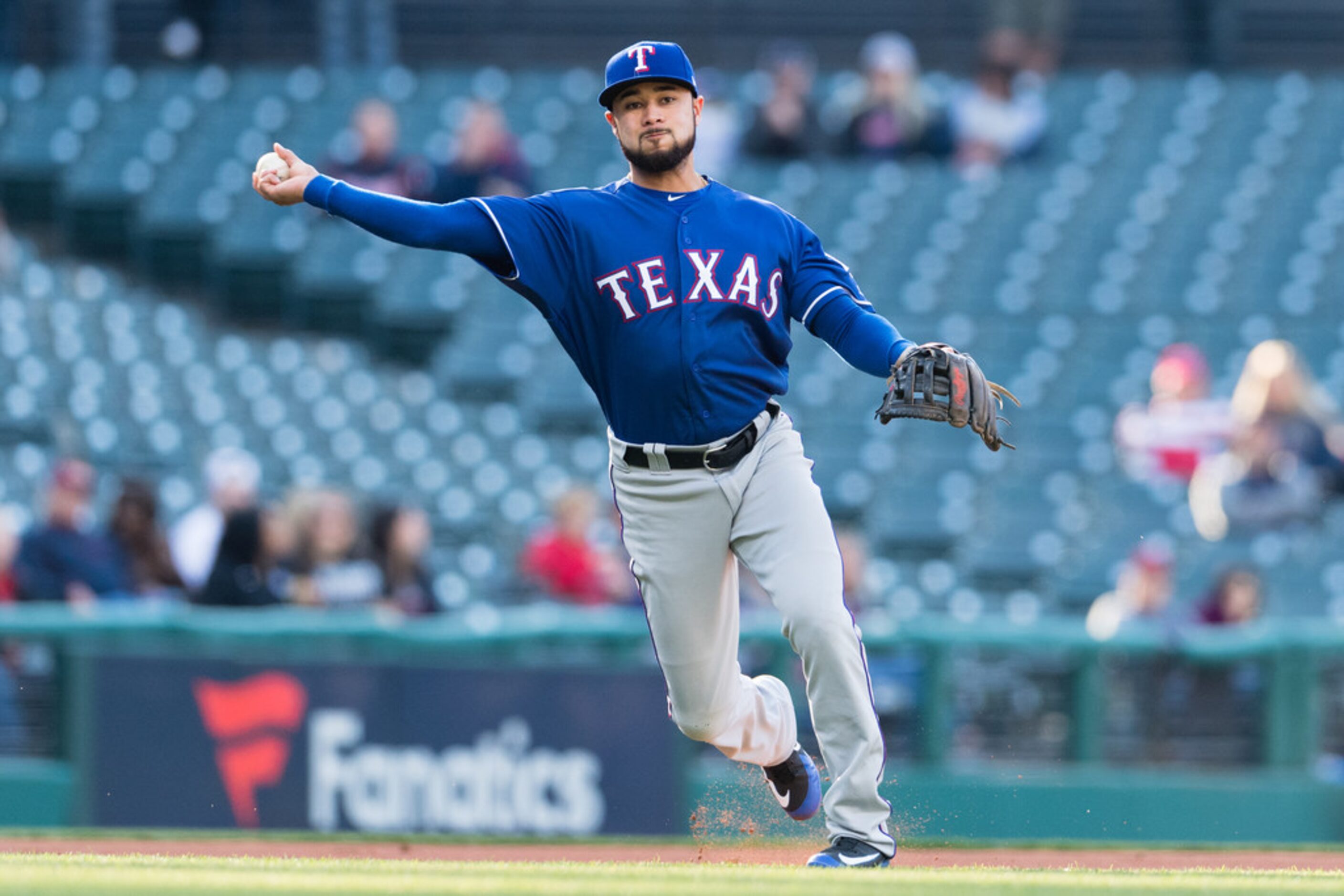 CLEVELAND, OH - APRIL 30: Third baseman Isiah Kiner-Falefa #9 of the Texas Rangers throws...