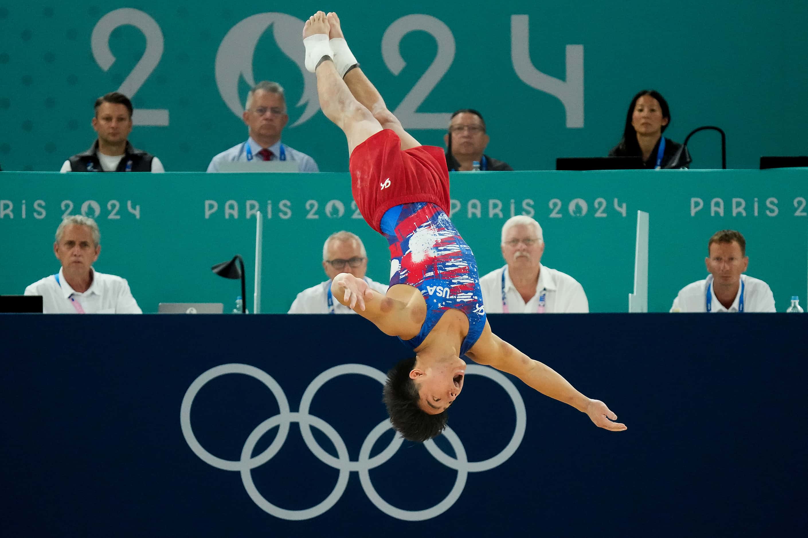 Asher Hong of the United States competes on the floor during men’s gymnastics qualifying at...