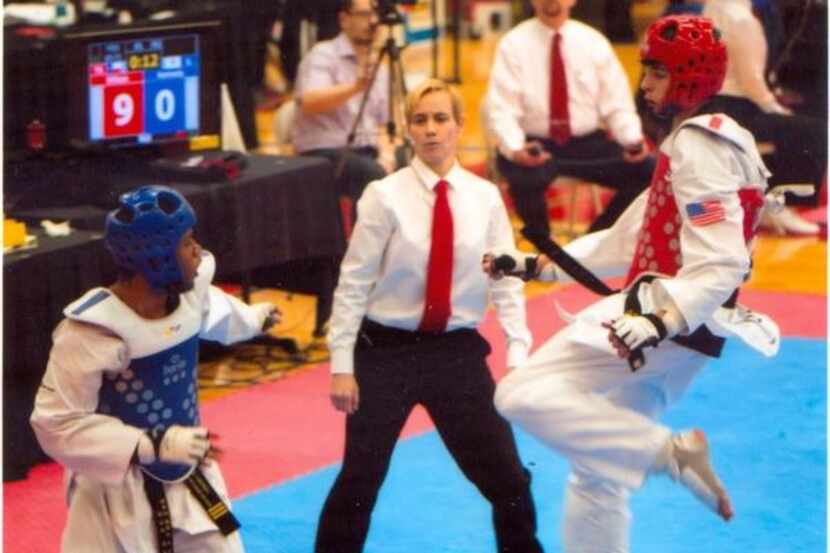 Coppell High School junior Connor Wilson, right, competes in a taekwondo competition.
