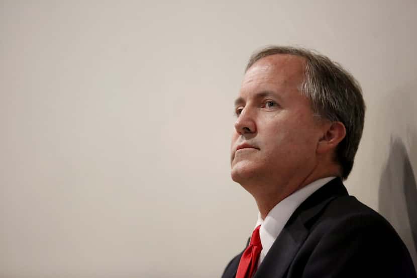 Texas Attorney General Ken Paxton, pictured just weeks before he was indicted in July 2015,...