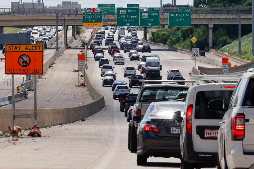Traffic backs up along Interstate 30, Tuesday, June 18, 2024, in Grand Prairie, Texas.