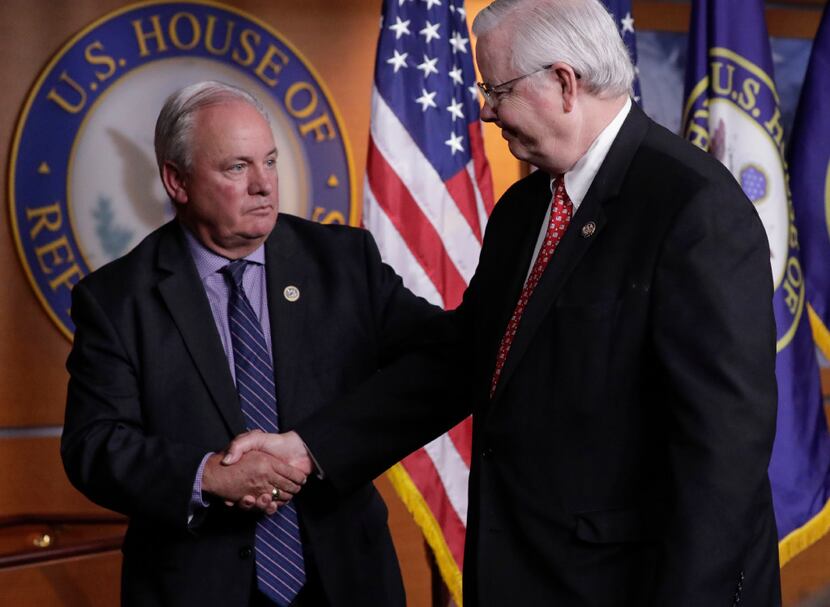 Rep. Mike Doyle, D-Pa., (left) and Rep. Joe Barton, R-Arlington, managers of the...