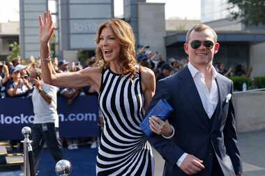 Dallas Cowboys executive vice president and chief brand officer Charlotte Jones waves to...