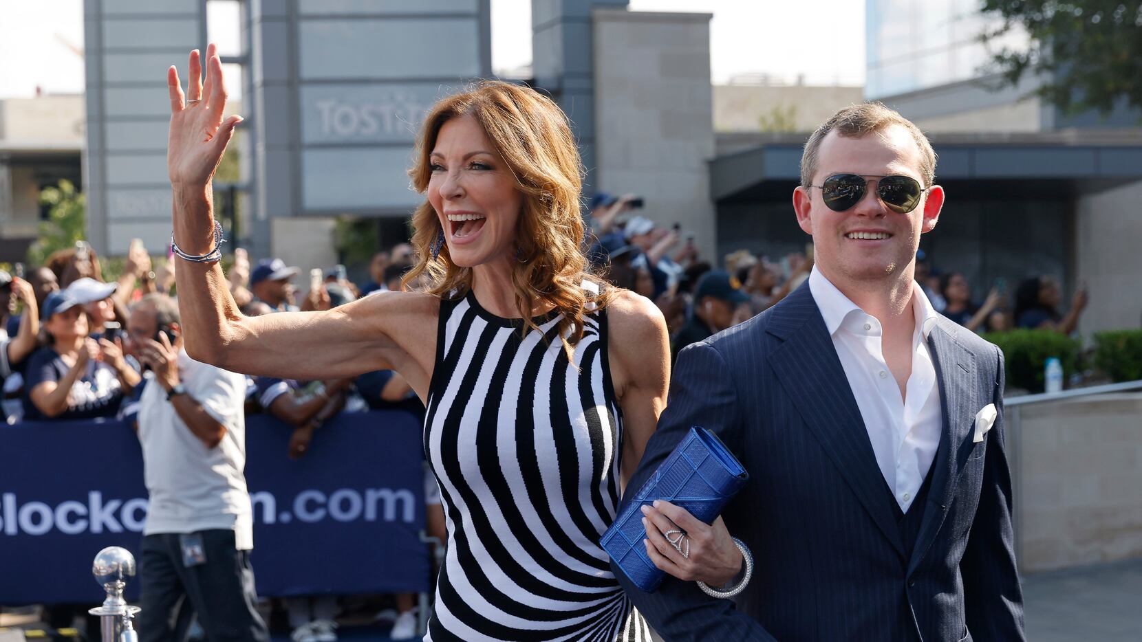 Dallas Cowboys executive vice president and chief brand officer Charlotte Jones waves to...