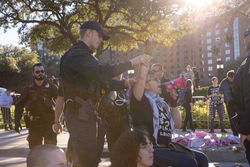 Police detain protestors in opposition of the Jewish National Fund’s Global Conference For...