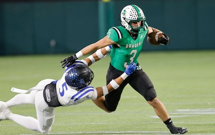 Southlake Carroll's Davis Penn (3) is tackled by Trophy Club Byron Nelson's Ashton Williams...