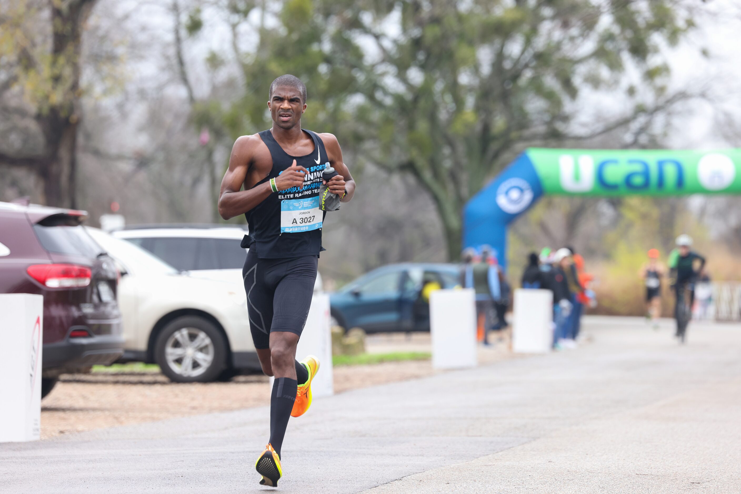 Marathon runner Jordon Garman reaches the 17 mile mark along East Lawther Drive during the...