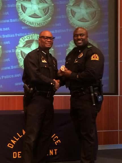 Aaron Bell (right) was promoted to lieutenant in 2013 by Chief David Brown.