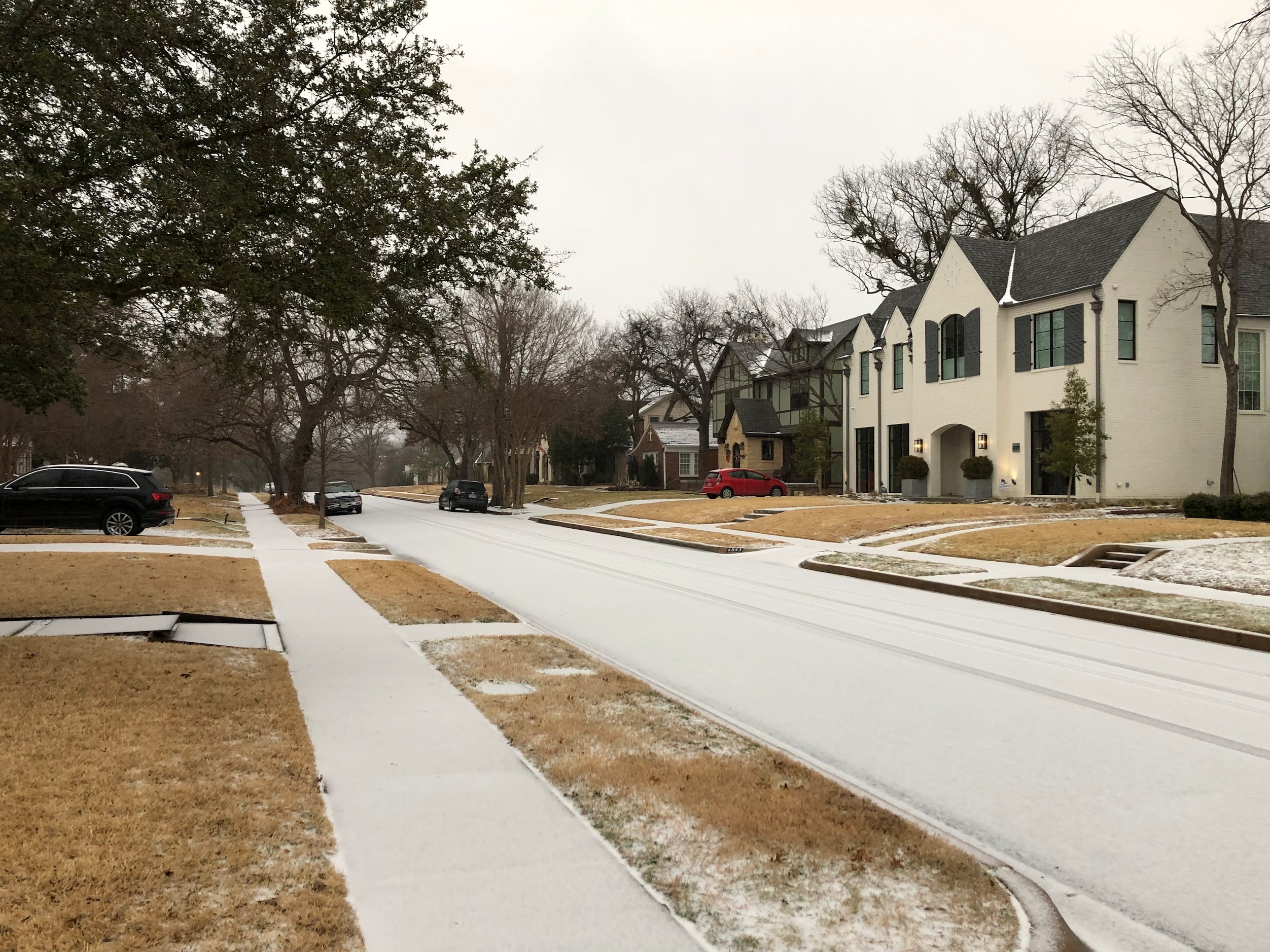 An icy mix covers a roadway in Lakewood in east Dallas on Tuesday, Jan. 31, 2023.