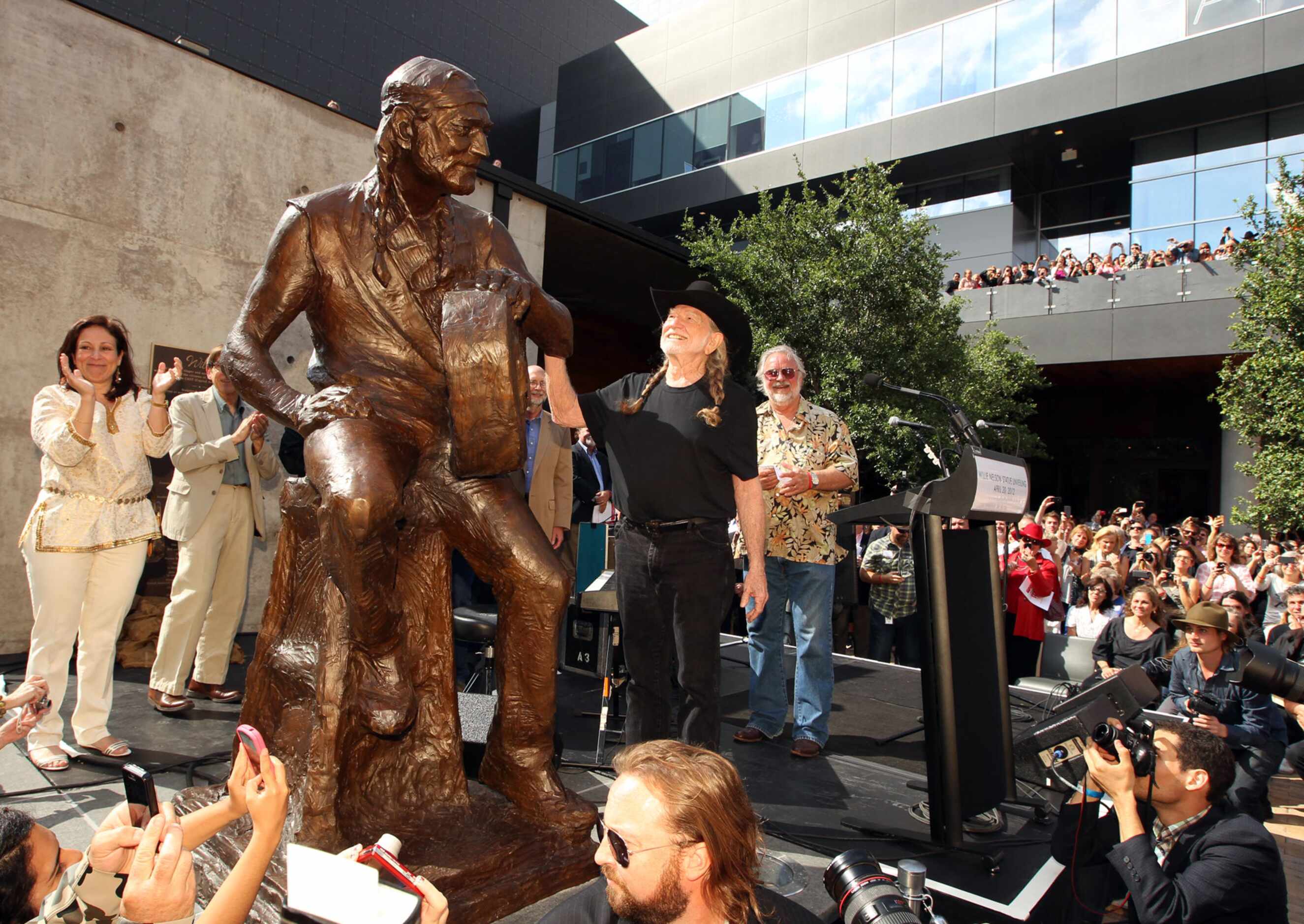 2012 - Willie Nelson surveys a newly unveiled larger-than-life bronze statue of himself at...