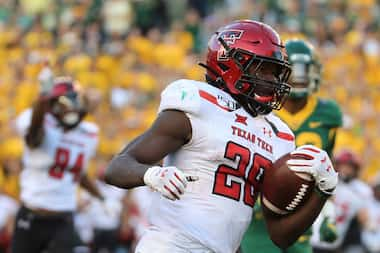 Texas Tech running back SaRodorick Thompson (28) scores a touchdown against Baylor during...