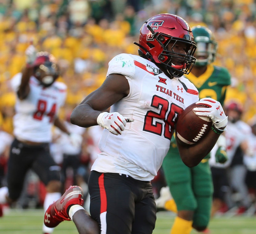 Texas Tech running back SaRodorick Thompson (28) scores a touchdown against Baylor during...