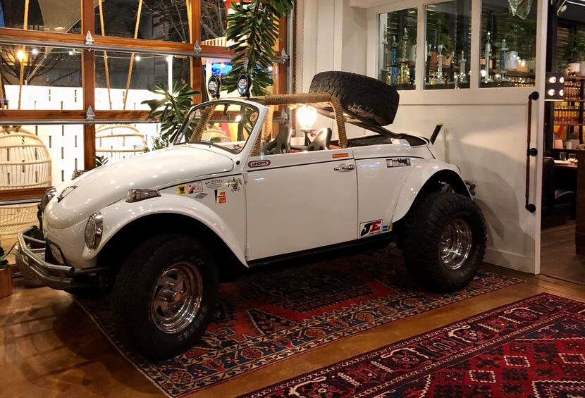 Take a walk around the bar and, hello: There's a white bug parked inside.