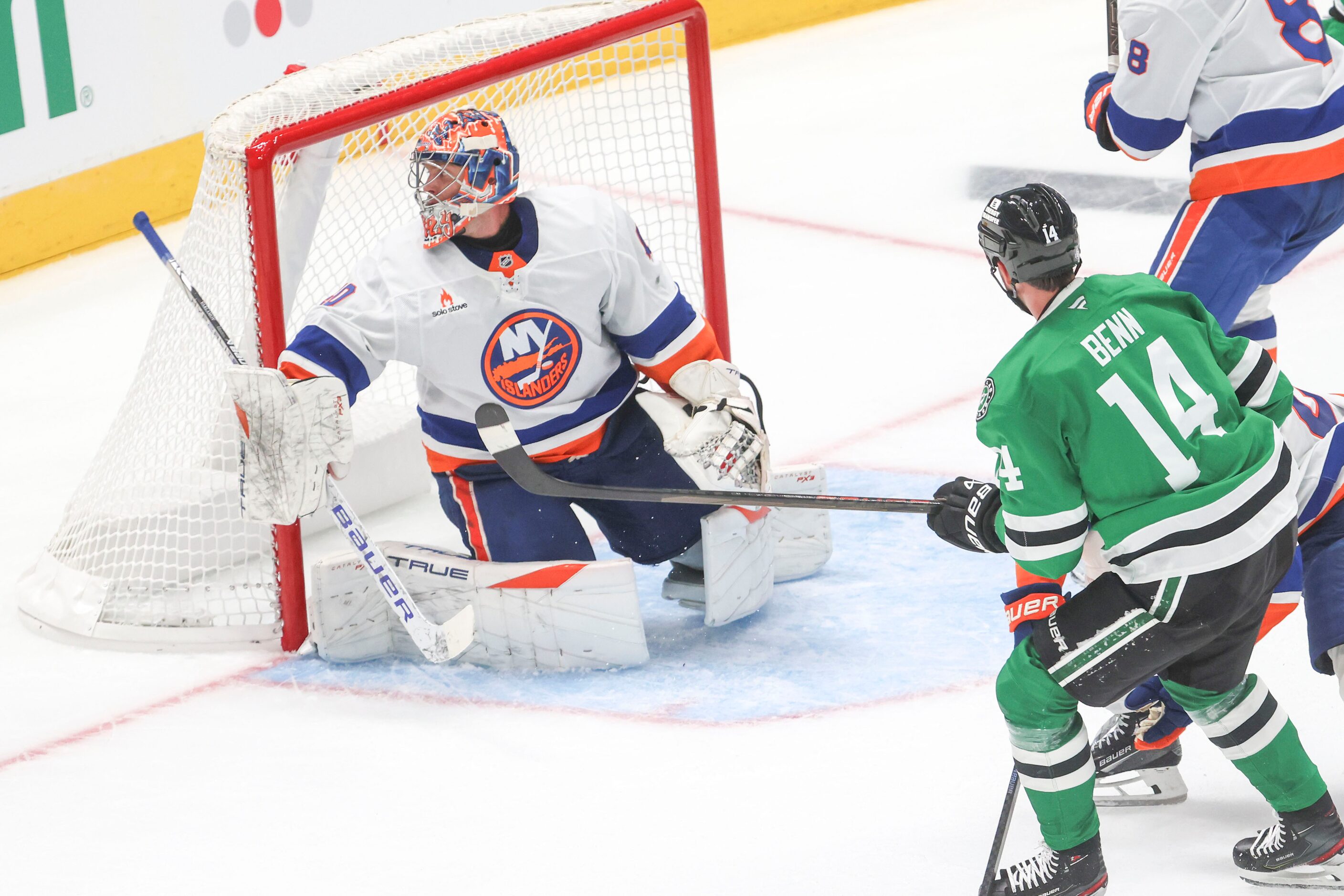 Dallas Stars left wing Jamie Benn (14) scores a goal past New York Islanders goaltender...