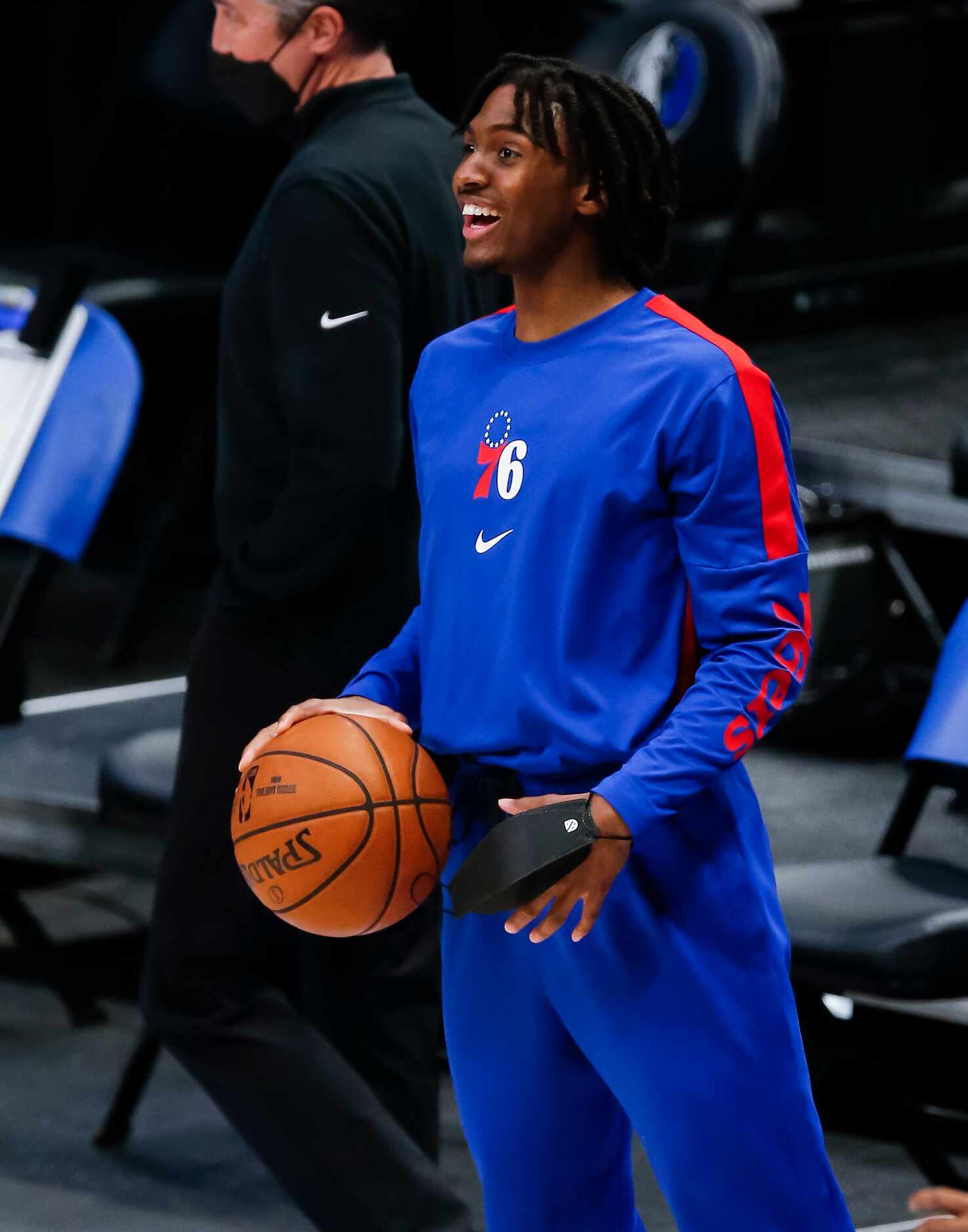 Philadelphia 76ers guard Tyrese Maxey warms up before the start of the second half of an NBA...
