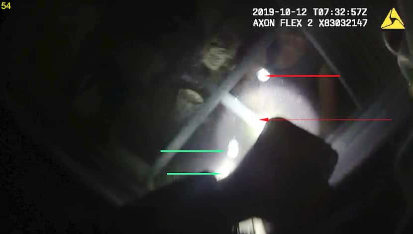 An image from Aaron Dean's body camera shows Atatiana Jefferson standing in the window just...