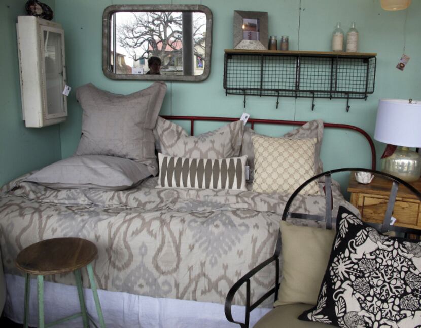 Vintage, modern, and antique furnishings and accessories are sold at Red, a home decor store...