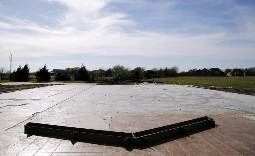 
Only the bare slab remains of Harvest of Praise Ministry’s building. This week, crews...