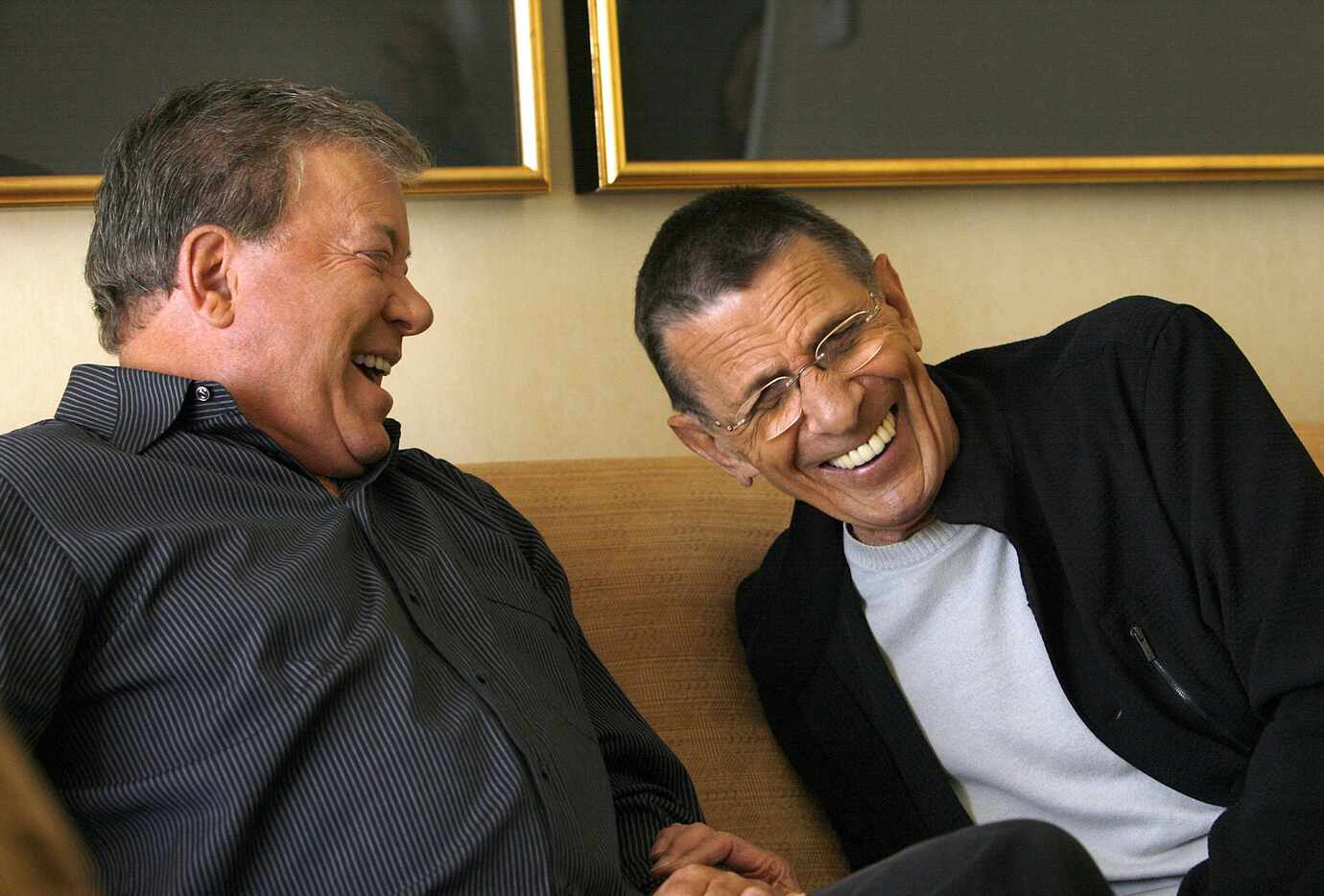 Actors William Shatner (L) and Leonard Nimoy laugh during an interview for the 40th...