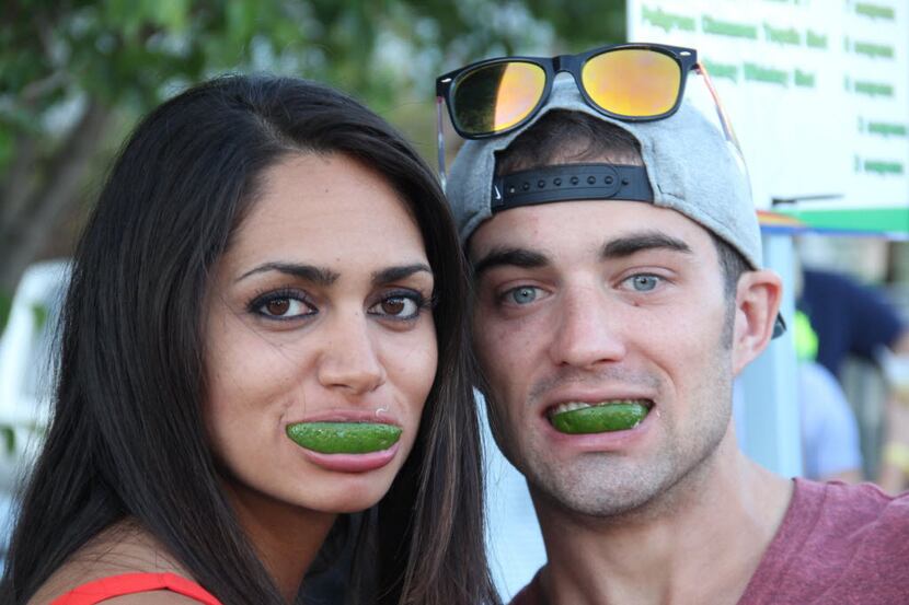 Limes are a must after a shot of tequila. Here, Sarah Obaidat and Ryan Bock celebrate Cinco...