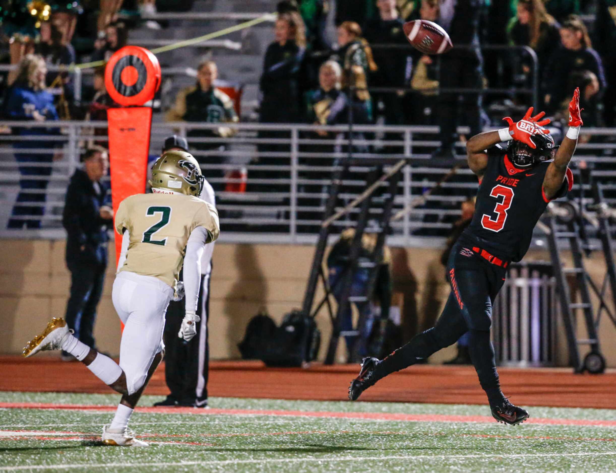 Colleyville Heritage wide receiver Isaac Shabay (3) receives a pass over Birdville defensive...