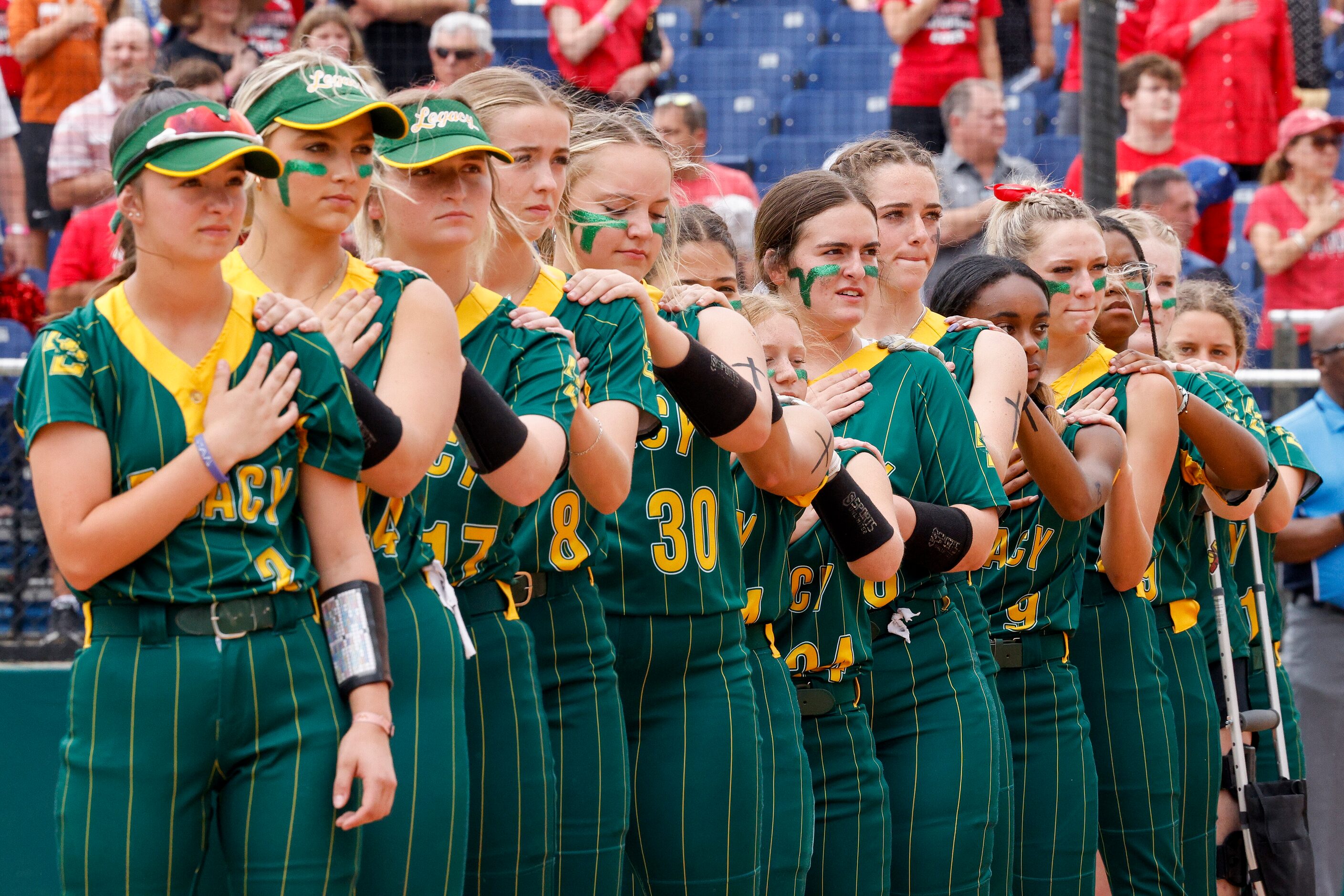 Frisco Legacy Christian players stand for the national anthem before the TAPPS Division II...