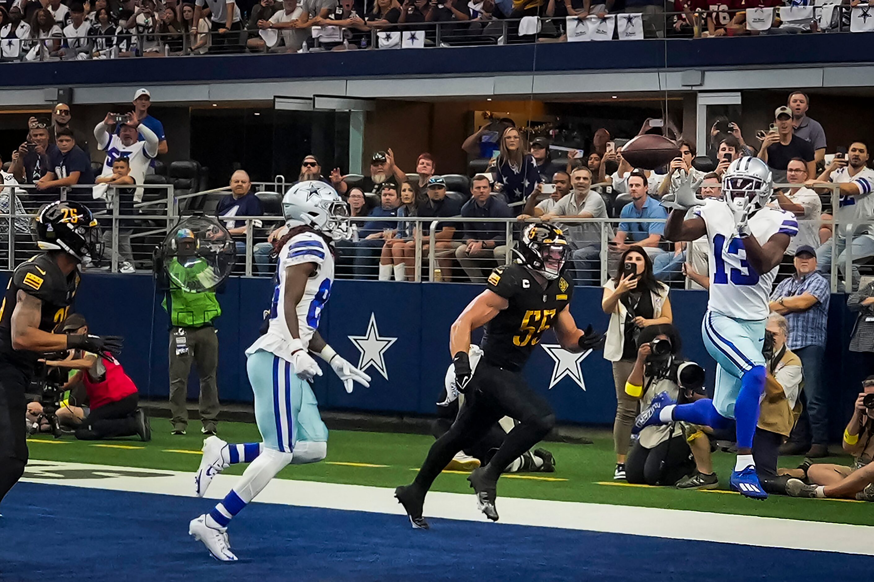 Dallas Cowboys wide receiver Michael Gallup (13) catches a touchdown pass as Washington...