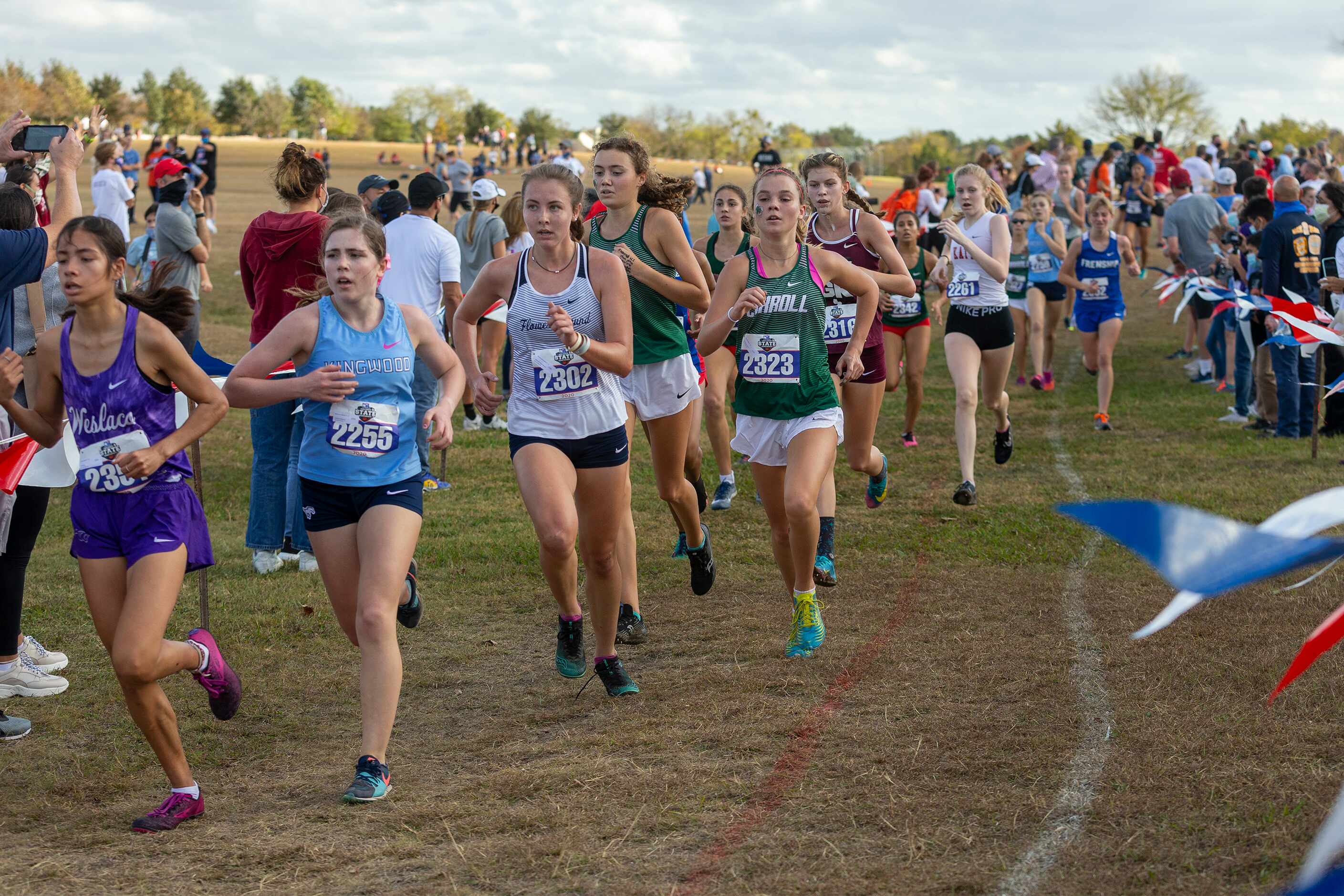 Flower Mound's Hannah McLaughlin (2302) and Southlake Carroll's Ava Bushaw (2323)compete in...