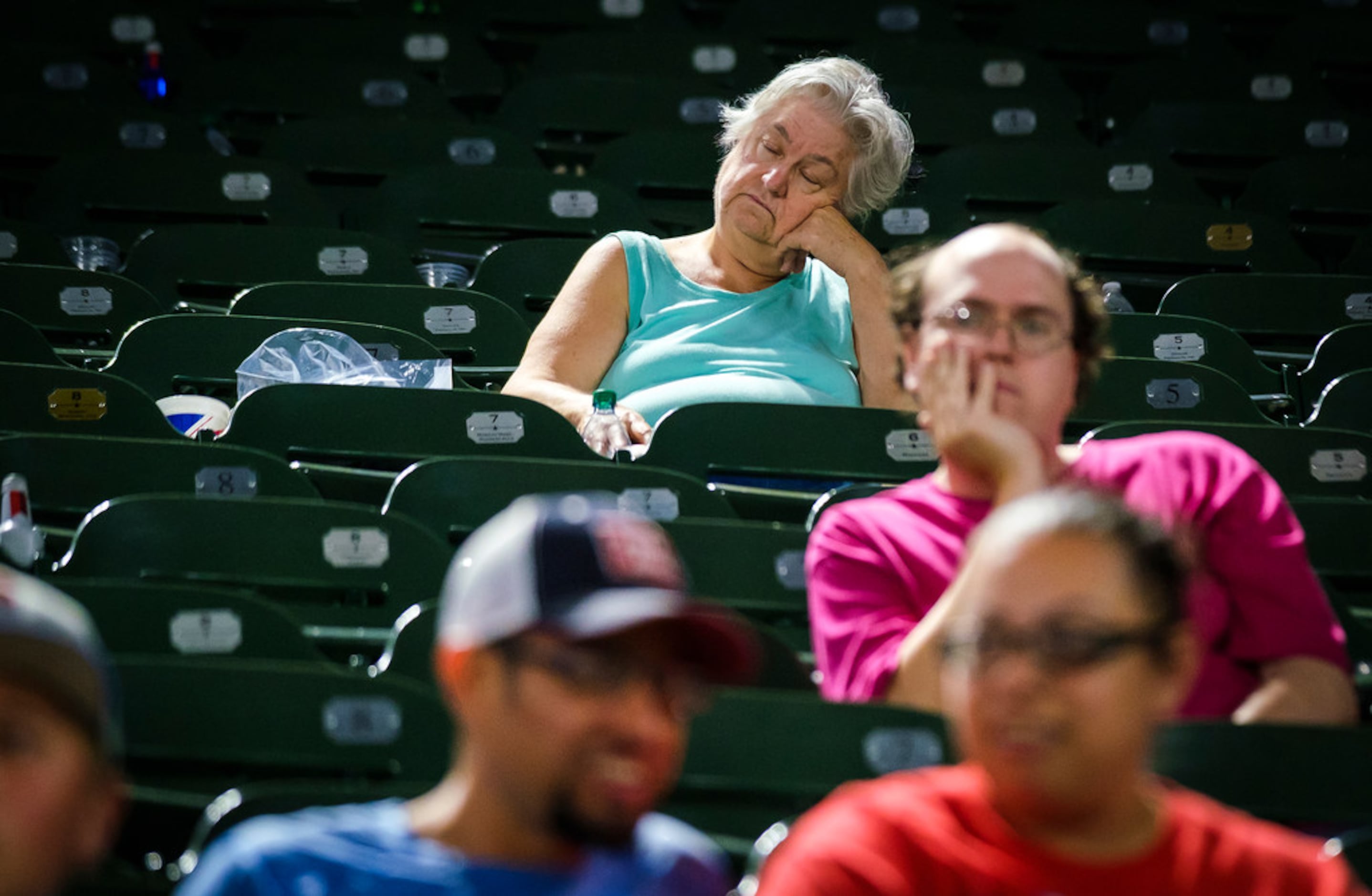 Fan watch during the eighth inning of a game between the Texas Rangers and the Tampa Bay...