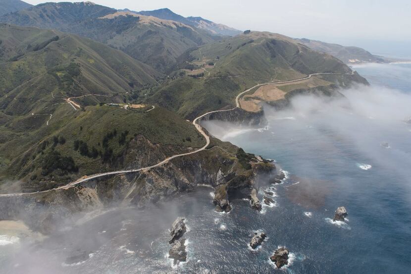 On the road from San Francisco to Los Angeles, look for the Big Sur coastline and Bixby...