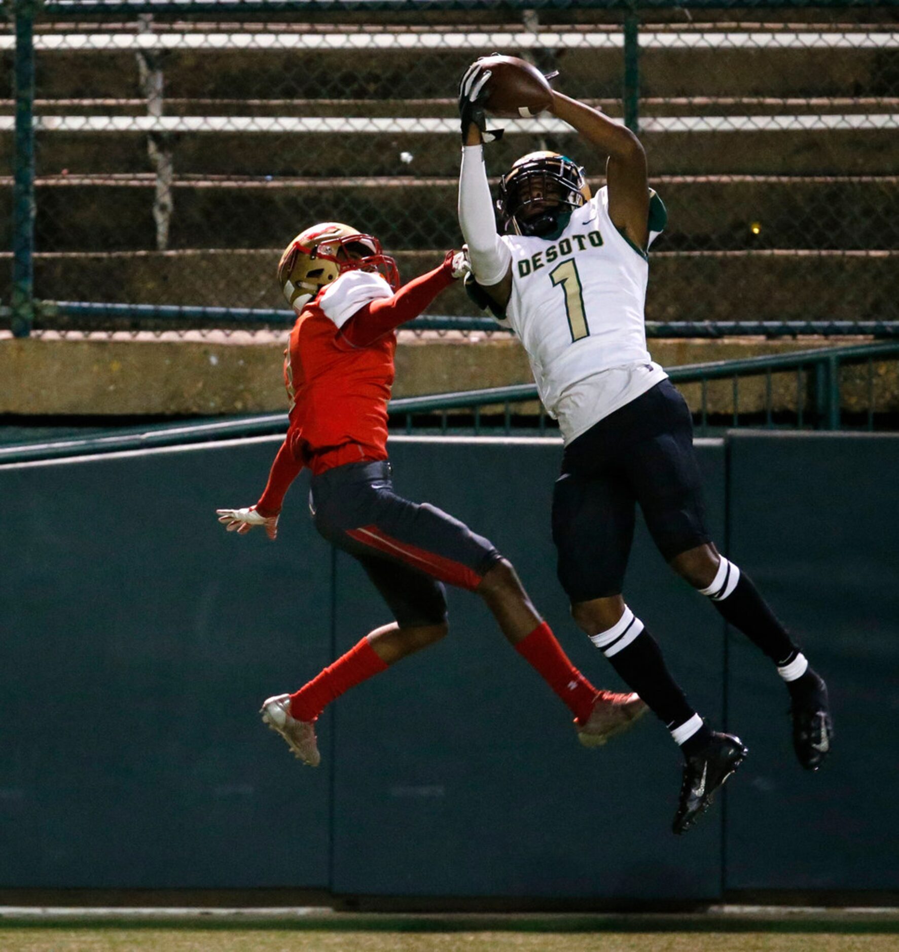 Desoto's Votae Shenault (1) catches the ball for a touchddown over South Grand Prairie's...