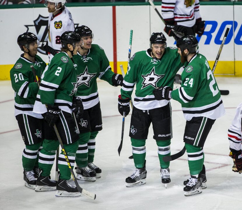 Dallas Stars center Colton Sceviour (22) and Dallas Stars defenseman Jordie Benn (24)...