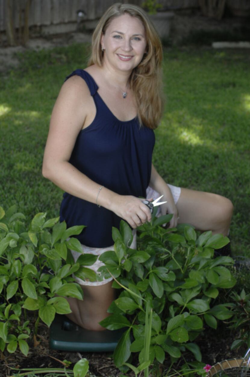 Michelle Gummer, who has rheumatoid arthritis, in her backyard garden in Dallas, Texas on...