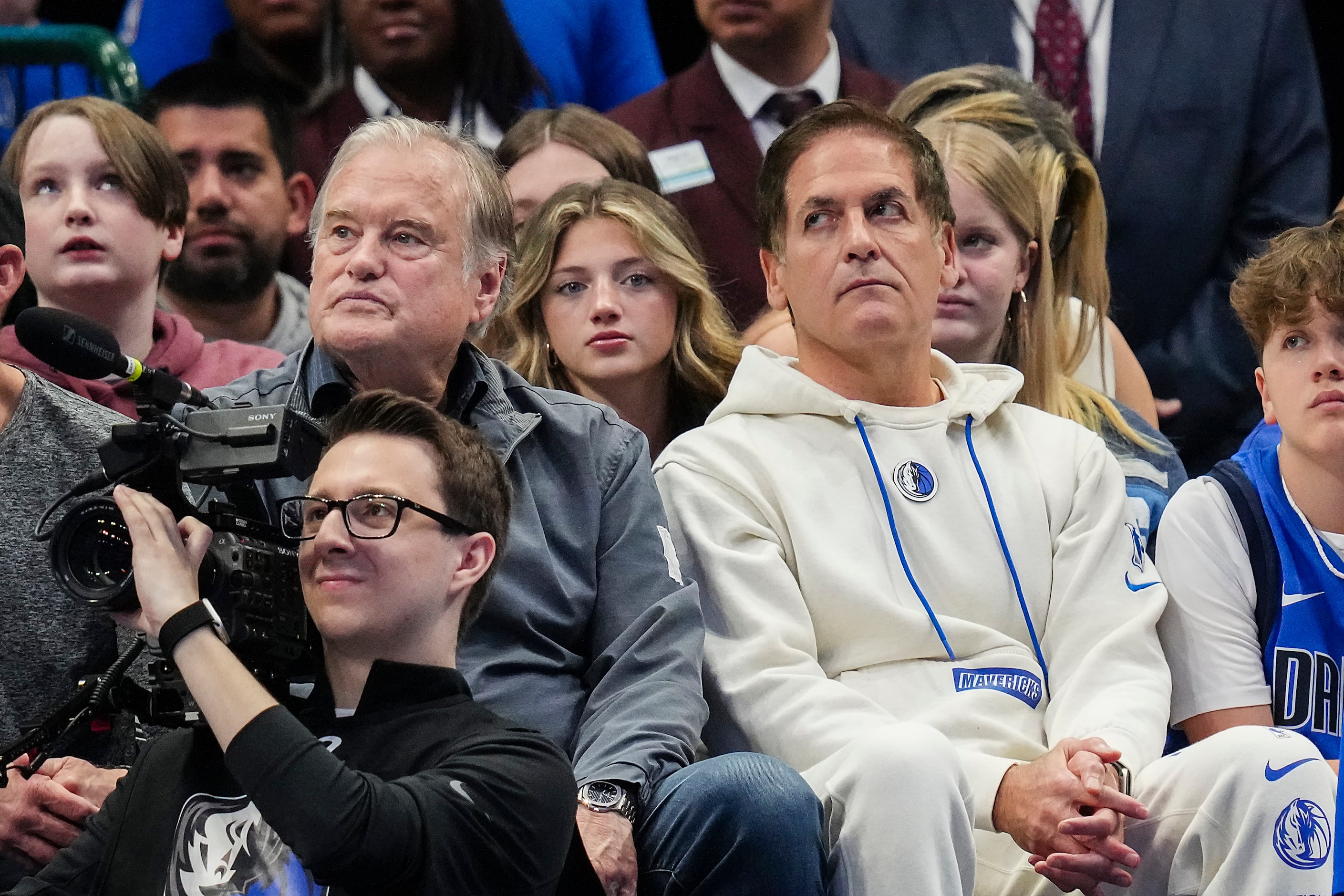 Dallas Mavericks governor Mark Cuban watches during the first half of an NBA basketball game...