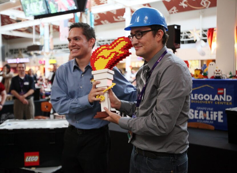 Retiring Lego Master Builder Cal Walsh, 25, (left), and Brandon Wike, 29, of Plano, lego a...