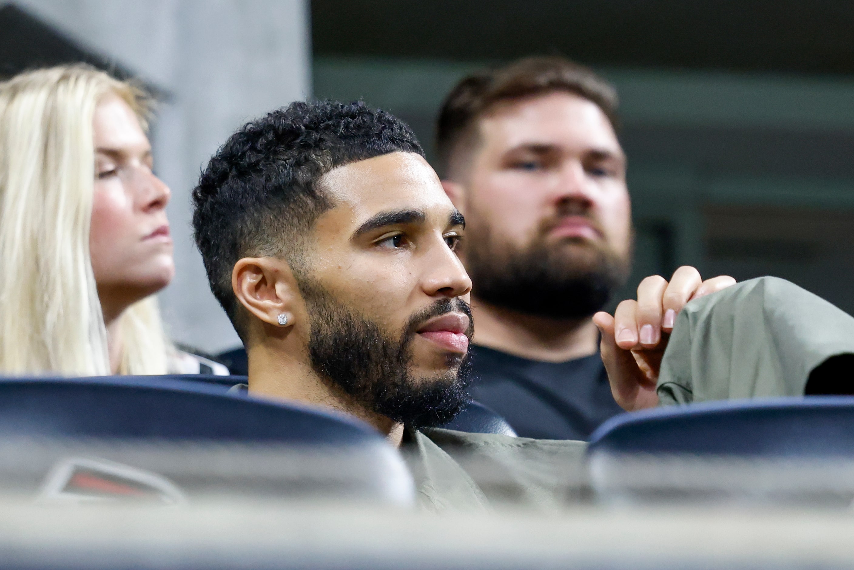 Boston Celtics power forward Jayson Tatum watches the second half between the Atlanta...