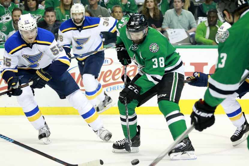 Dallas Stars center Vernon Fiddler (38) races to the goal for a first period shot against...