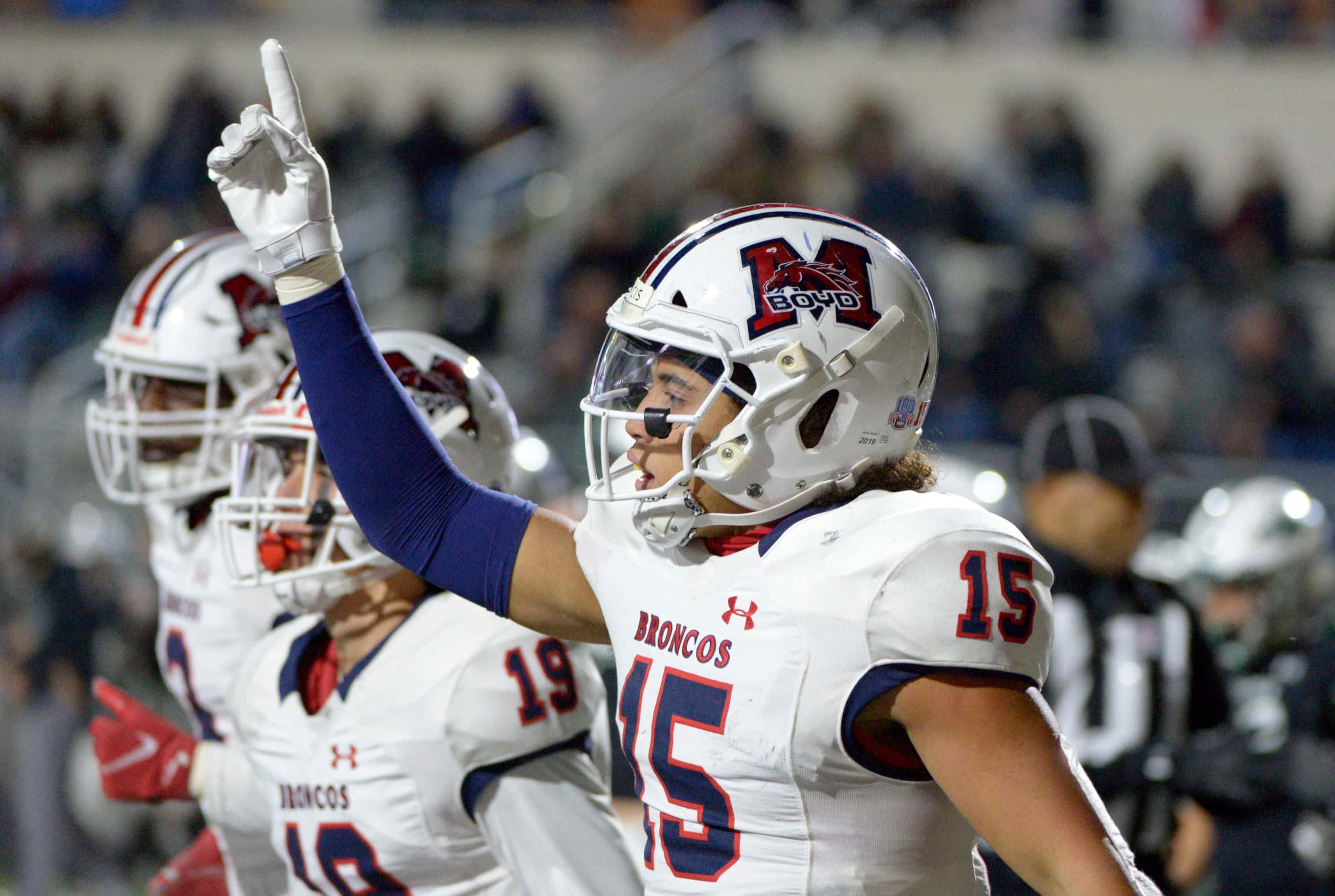 McKinney Boyd’s Carter Whitefield celebrates after his touchdown in the first half of a high...