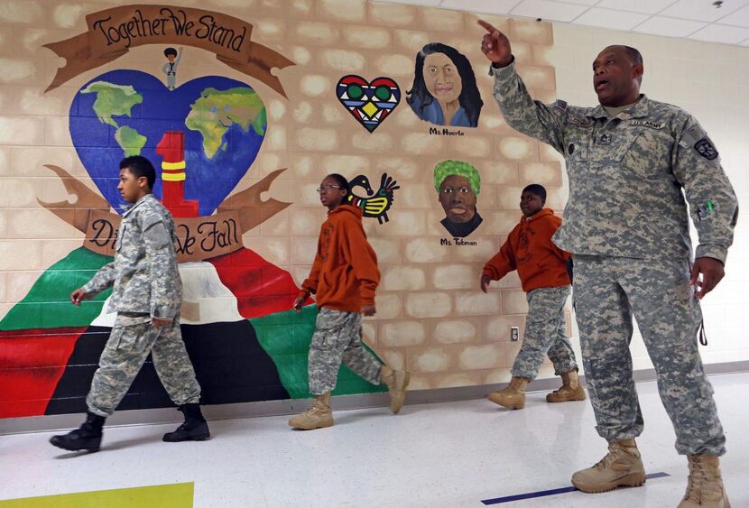 
Sgt. Otha Stewart directs Billy Earl Dade Middle School students in the Leadership Cadet...