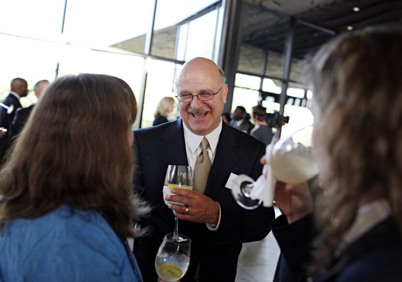  Dallas Police Department Assistant Police Chief Daniel Garcia mingles during a forum for...