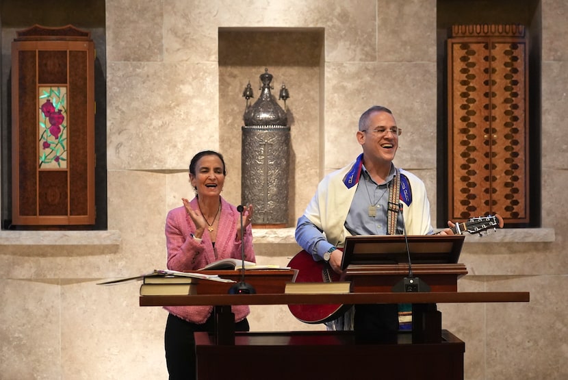 Gayle Pomerantz, left, senior rabbi at Temple Beth Sholom, and Cantor Juval Porat sing...