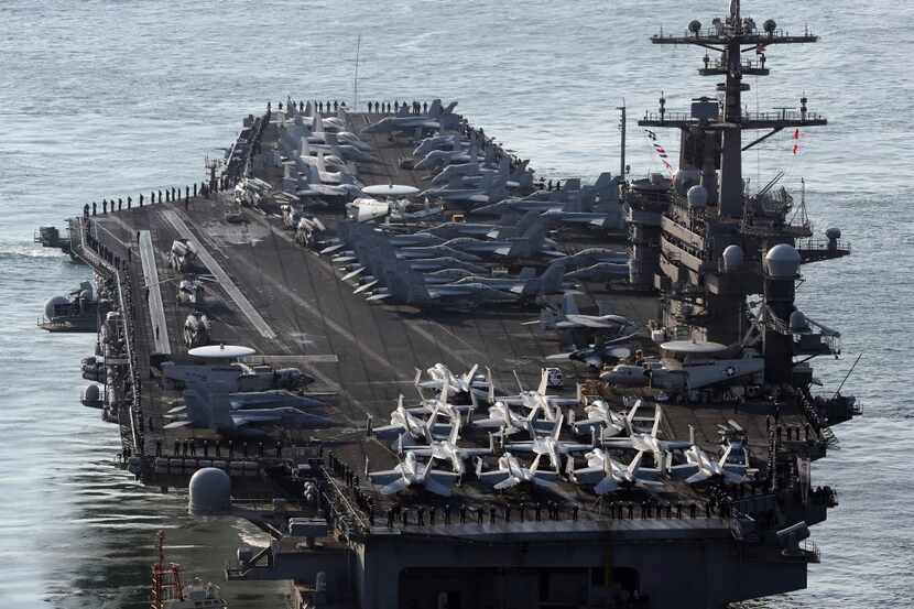 FILE - In this March 15, 2017 file photo, U.S. Navy aircraft carrier, the USS Carl Vinson...