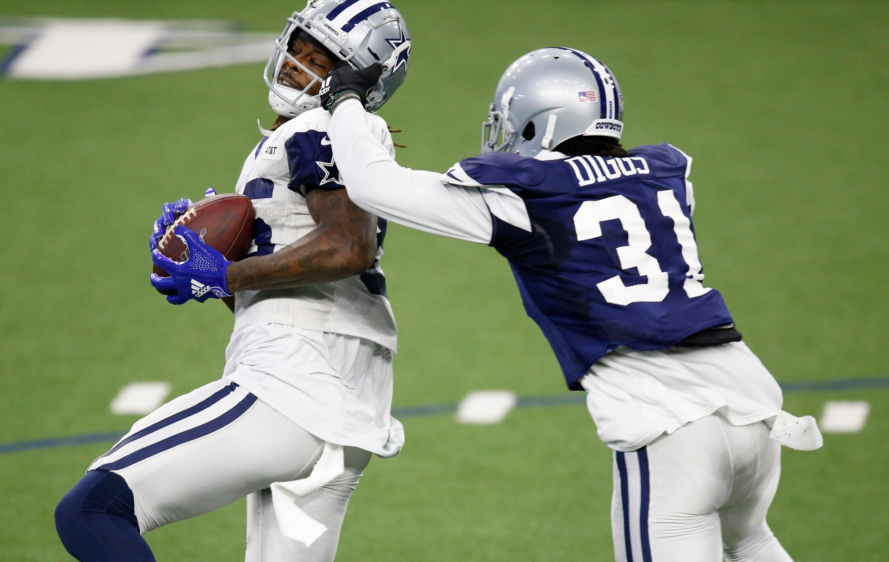 Dallas Cowboys wide receiver Noah Brown (85) is hit in the face as he is defended by Dallas...