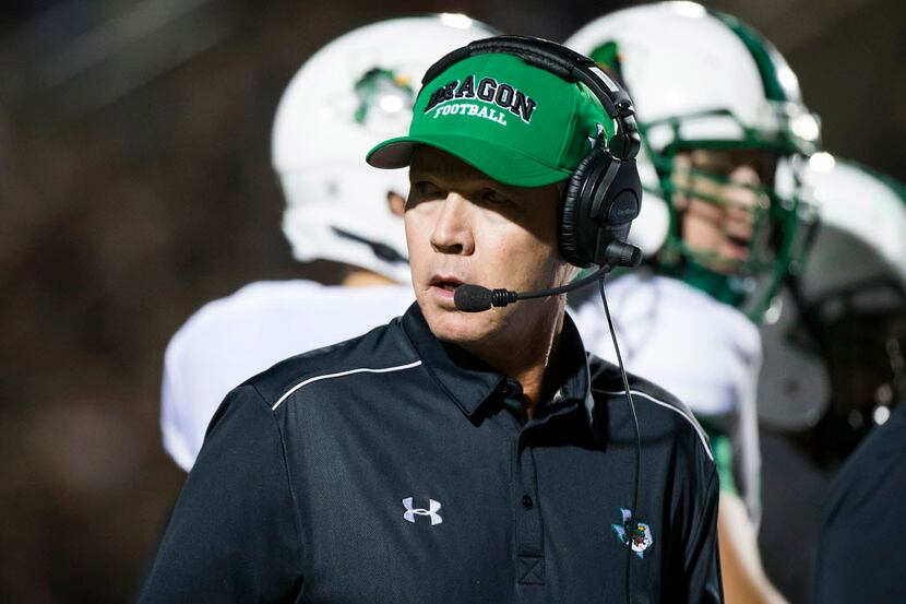 Southlake Carroll head coach Hal Wasson looks back toward the bench during a time out in the...