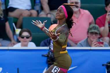Sha'Carri Richardson celebrates her win in the wins women's 100-meter run final during the...