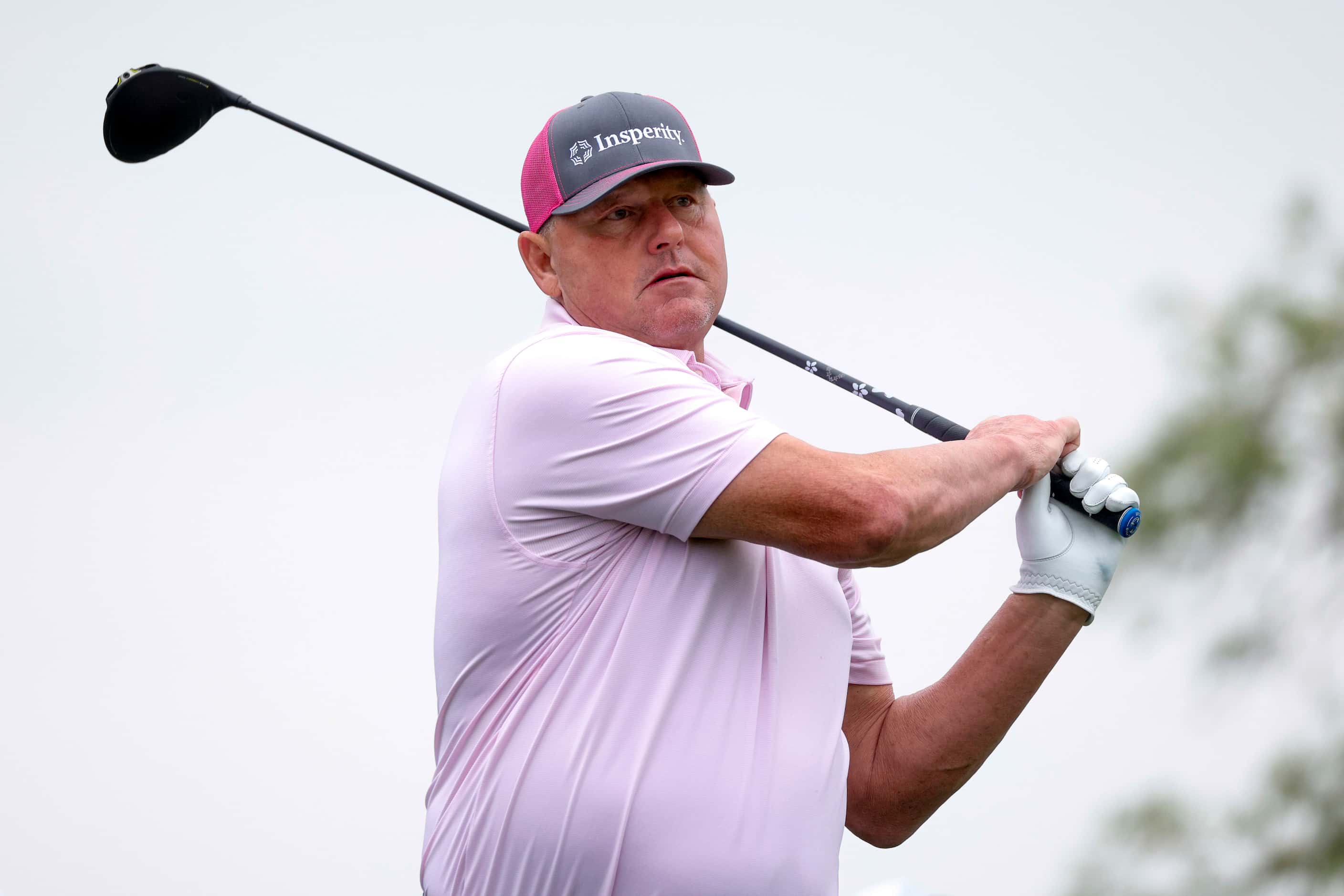 Former MLB pitcher Roger Clemens hits his tee shot off the first hole during the first round...