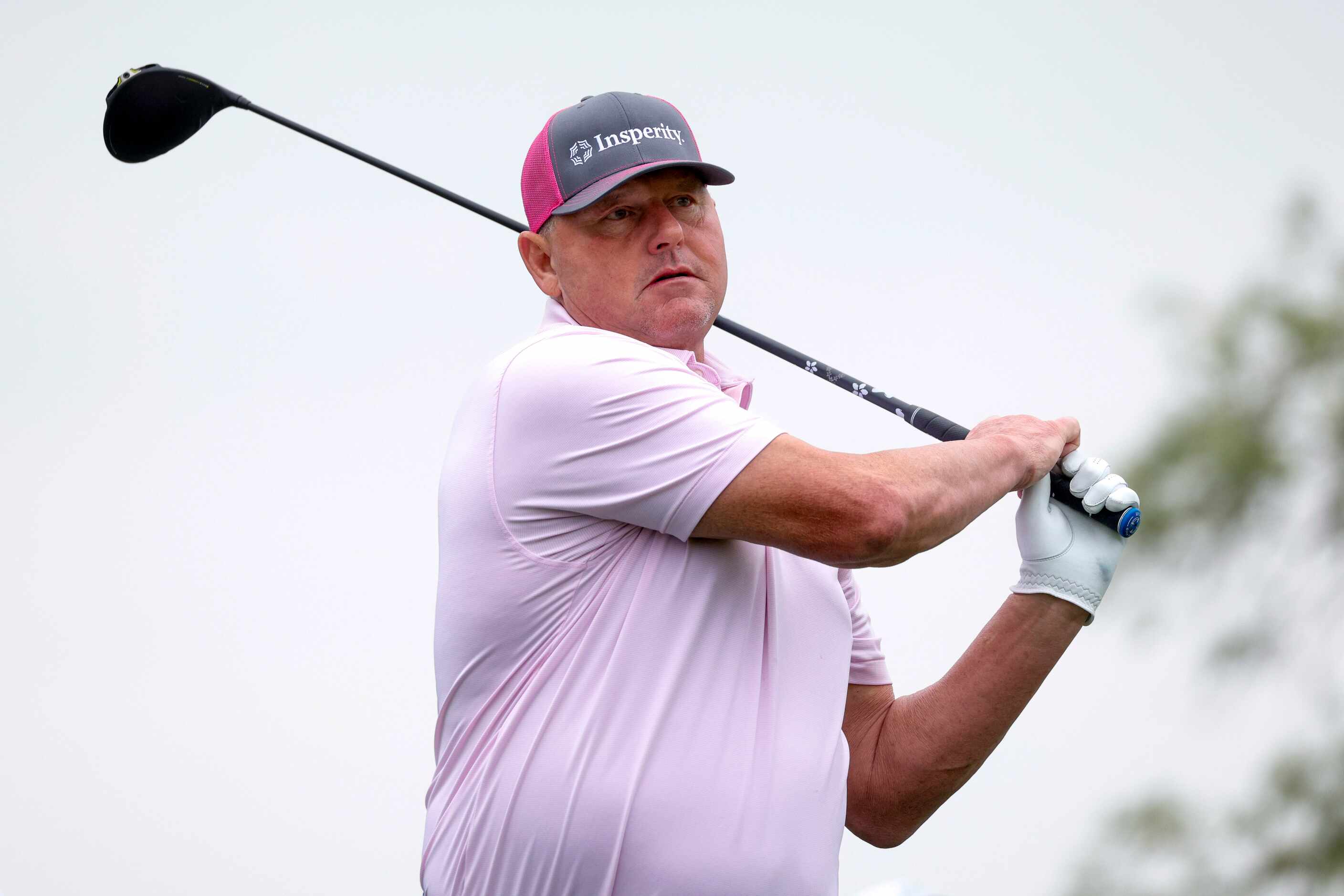 Former MLB pitcher Roger Clemens hits his tee shot off the first hole during the first round...